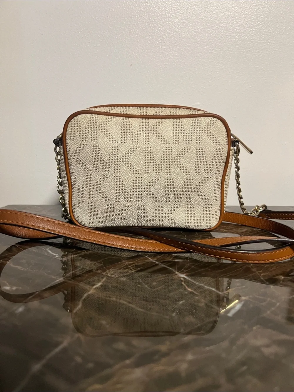 Michael Kors Jet Set Small Crossbody Bag in a vanilla and acorn color trim strap